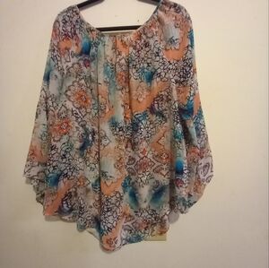 V neck top. Sheer material